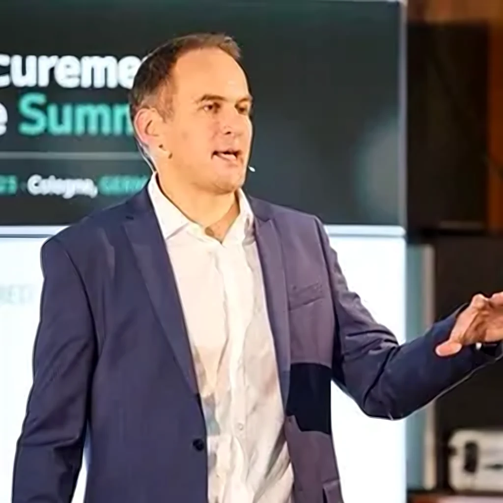 Tom Mills speaking at the Procurement Summit